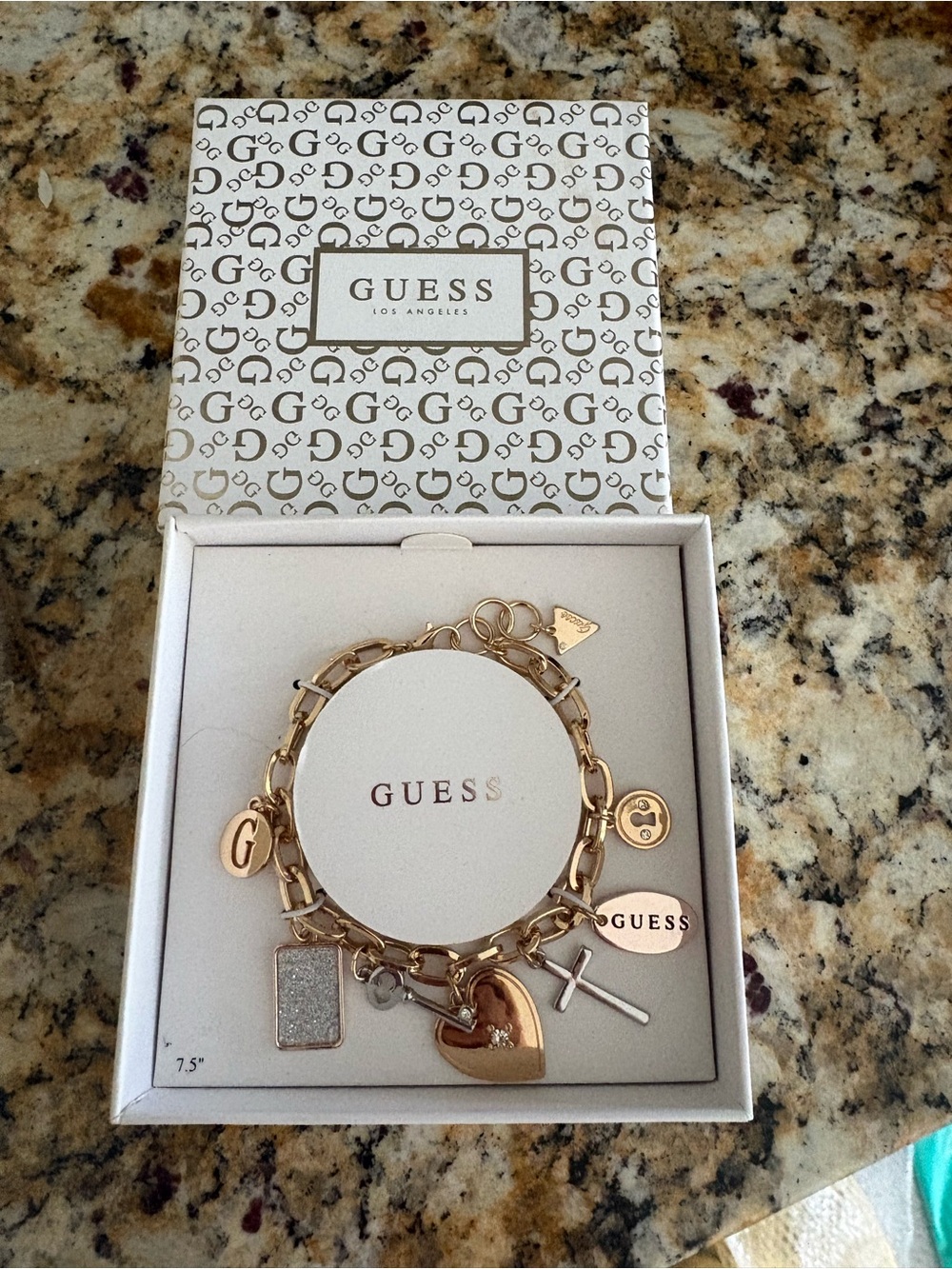 GUESS Gold-Tone Charm Bracelet with Mixed Charms